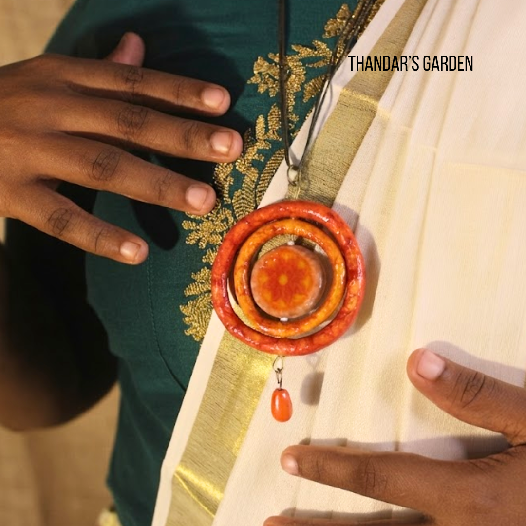 Pookalam Radiant Ring Pendant