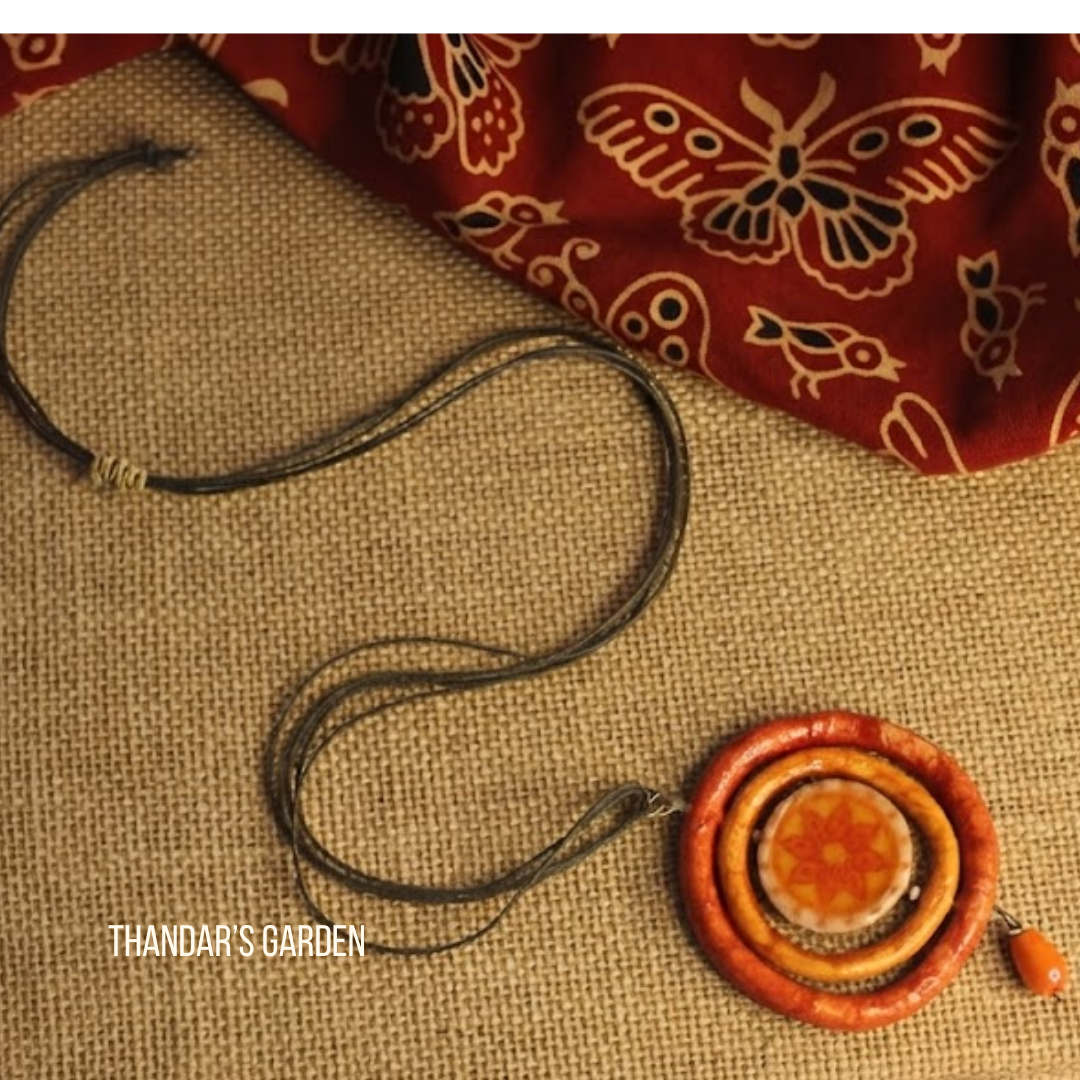 Pookalam Radiant Ring Pendant